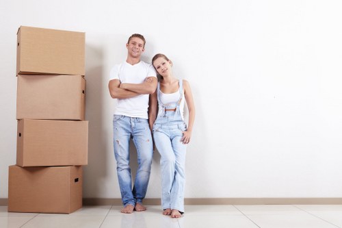 Removals team preparing a move in Harlesden residential street