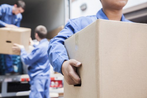 Office relocation planning in Harlesden with boxes and workstations
