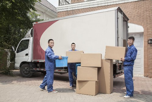 Worker checking clear access and emergency awareness during a move