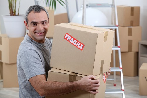 Moving van and boxes for a home move in Harlesden