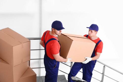 House movers loading furniture in Harlesden