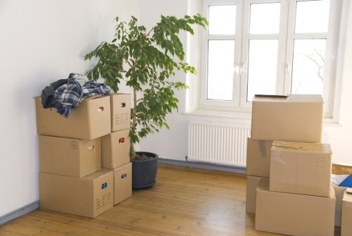 Furniture and boxes being loaded for a Harlesden move