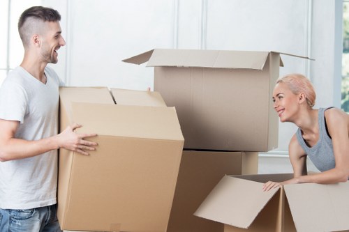 Boxes and household items prepared for transport by a man and van service